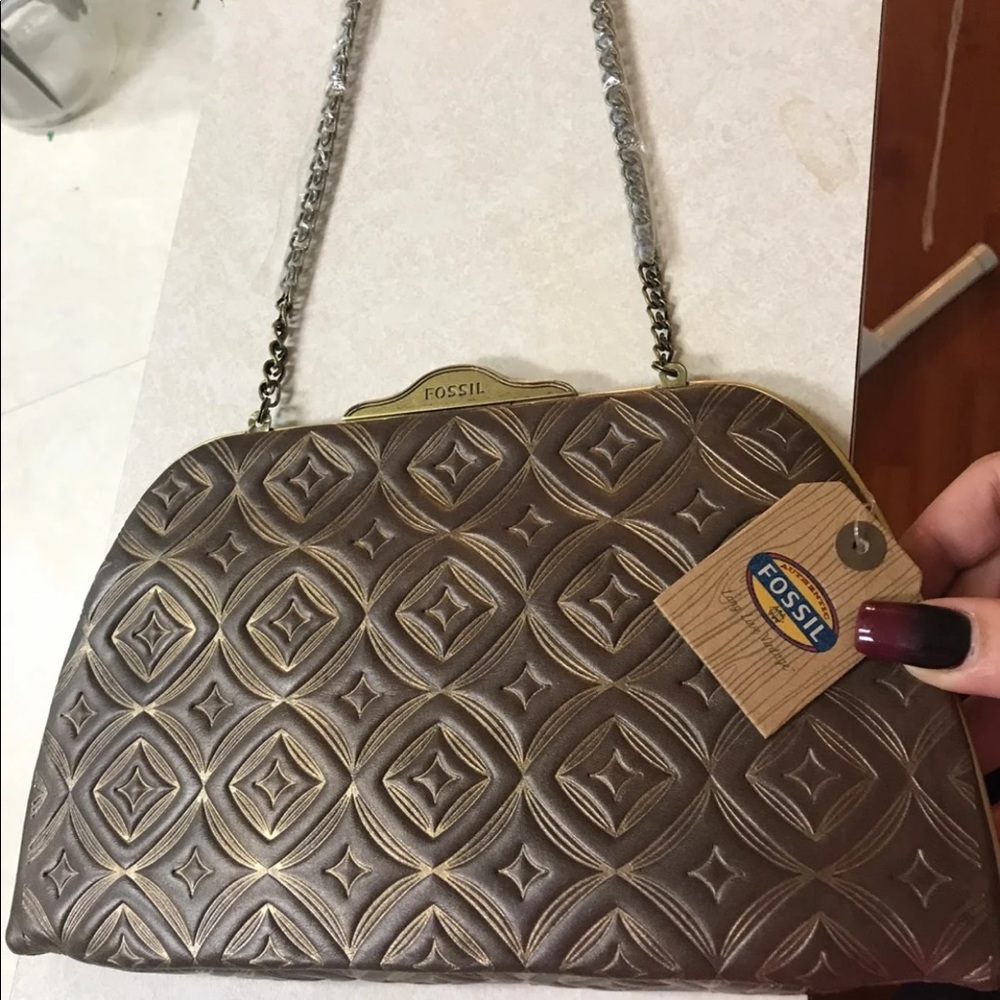 Fossil leather clutch